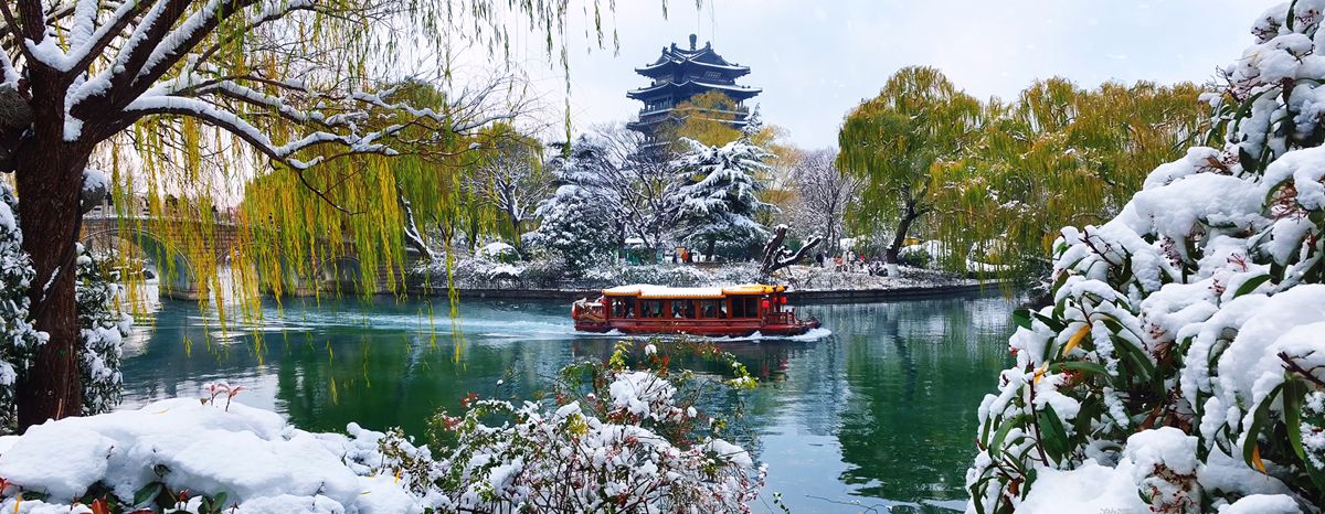 Snow blankets Daming Lake in winter calm